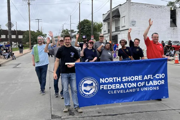 Union members march in Ohio's 11th Congressional District Labor Day Parade