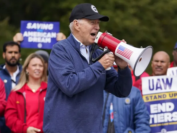 President Joe Biden joins striking United Auto Workers on the picket line, Tuesday, in Van Buren Township, Mich.Evan Vucci | AP