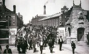 Workers leave the Pullman Palace Car Works, 1893. This picture appeared in a promotional booklet celebrating the labor policies of George Pullman. Photo: Wikimedia Commons