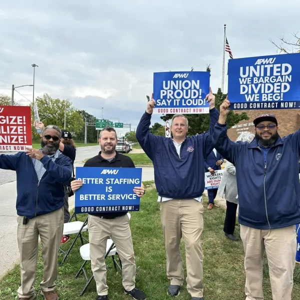 Postal workers picket at the Orange Avenue Post Office